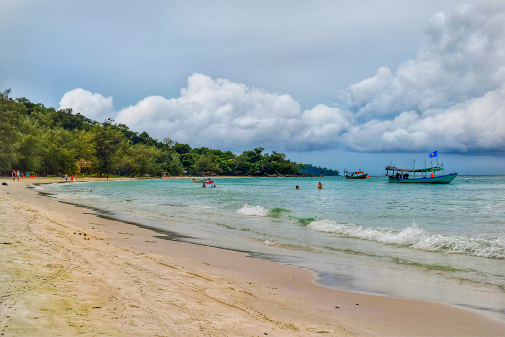 Beach surrounded by water and trees India to Cambodia itinerary