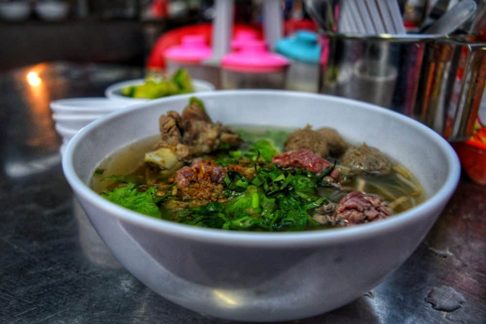 bowl of vegetables and meat in broth 