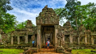 Hindu temple surrounded by trees India to Cambodia itinerary