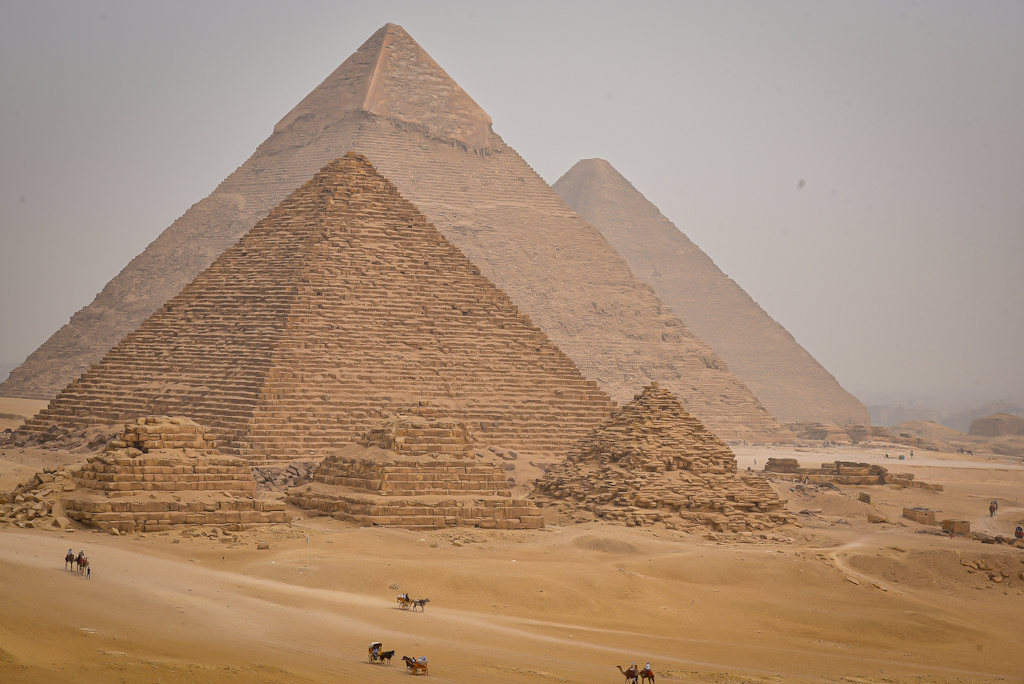 pyramids with camels around scams in egypt