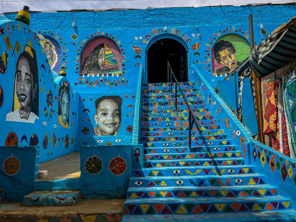 blue house in nubian village in egypt